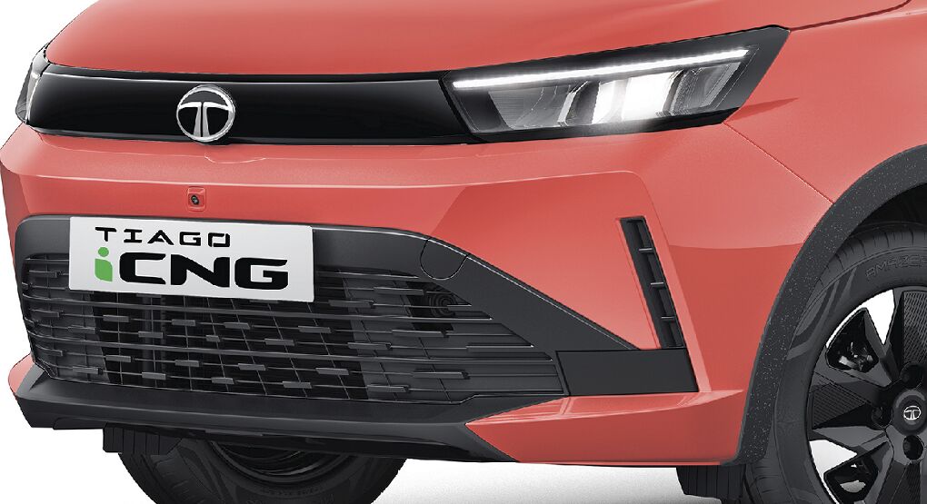 Sporty Wide Lower Front Grille
Stretching nearly corner to corner, it visually anchors the Tiago with a high-performance hatch stance that commands every road.
